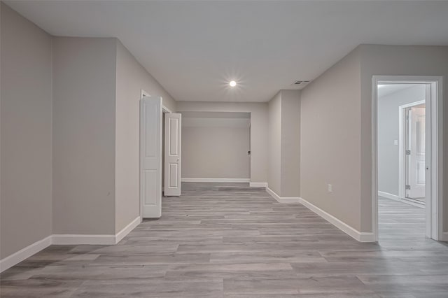 11502 Leader St, Houston, TX 77072 - hall with recessed lighting and light wood-style floors