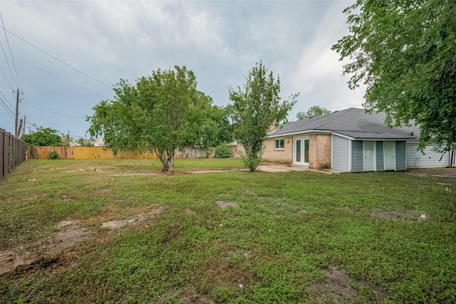 11502 Leader St, Houston, TX 77072 - fenced backyard with a patio and french doors