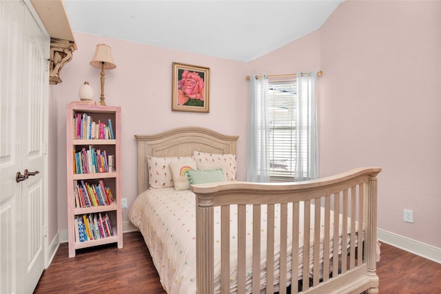 11210 Walden Rd, Montgomery, TX 77356 - bedroom featuring lofted ceiling and wood finished floors