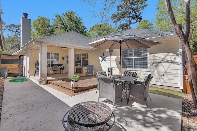 11210 Walden Rd, Montgomery, TX 77356 - view of patio with a deck and outdoor dining area