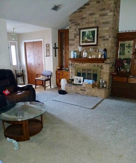 903 Happy Holw, Sweeny, TX 77480 - carpeted living area featuring vaulted ceiling and a brick fireplace