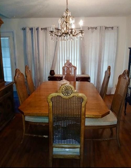 903 Happy Holw, Sweeny, TX 77480 - dining space with a chandelier and wood finished floors