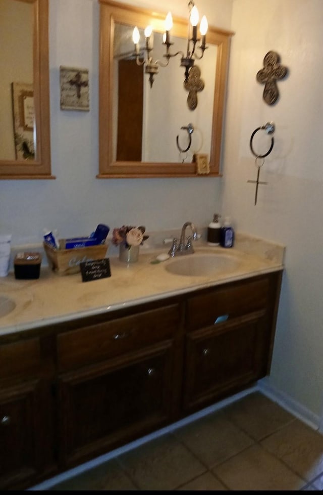 903 Happy Holw, Sweeny, TX 77480 - bathroom with double vanity, a chandelier, and tile patterned flooring