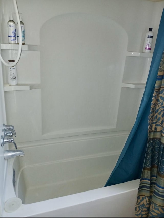 903 Happy Holw, Sweeny, TX 77480 - bathroom featuring shower / bath combo