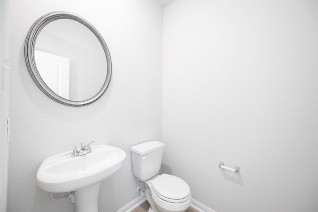 16866 Needlepoint Dr, Conroe, TX 77302 - bathroom featuring a sink and toilet