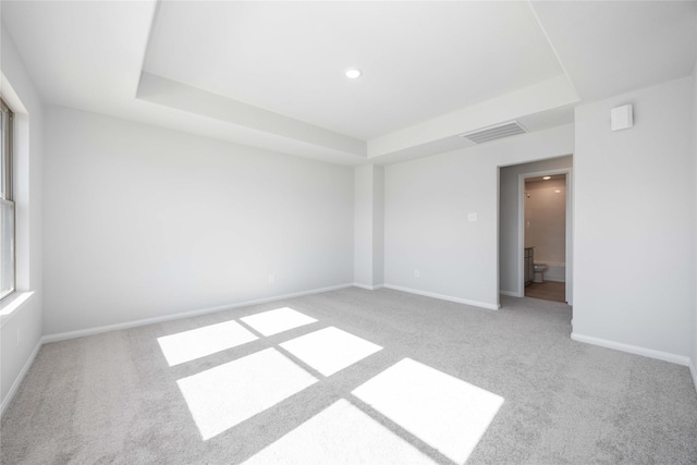 16866 Needlepoint Dr, Conroe, TX 77302 - unfurnished room with carpet, a tray ceiling, and recessed lighting