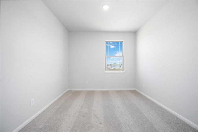 16866 Needlepoint Dr, Conroe, TX 77302 - carpeted empty room featuring baseboards