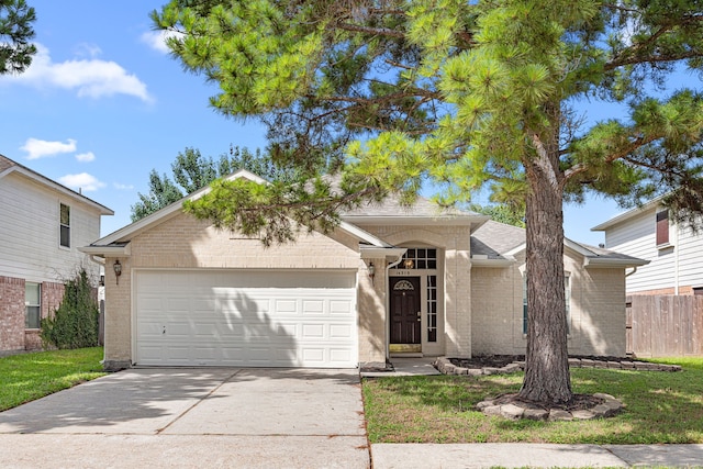 14319 Heron Marsh Dr, Cypress, TX 77429 - view of front facade with brick siding, concrete driveway, and an attached garage