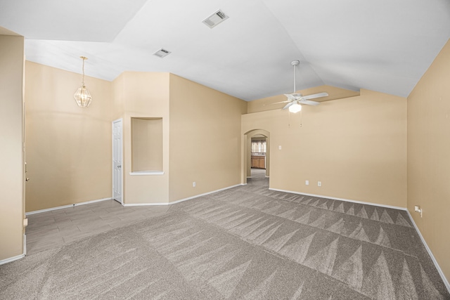 14319 Heron Marsh Dr, Cypress, TX 77429 - empty room featuring carpet floors, ceiling fan, arched walkways, and high vaulted ceiling