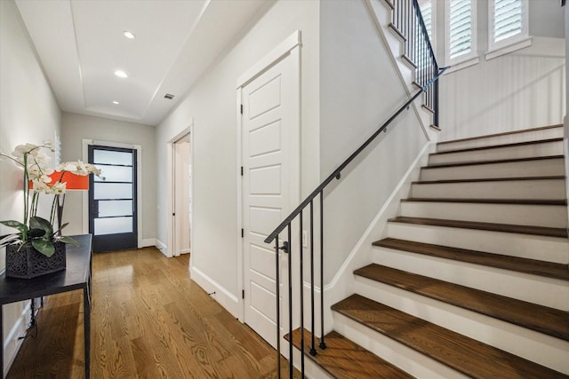 1116 W Drew St, Houston, TX 77006 - entrance foyer featuring stairs, wood finished floors, and recessed lighting