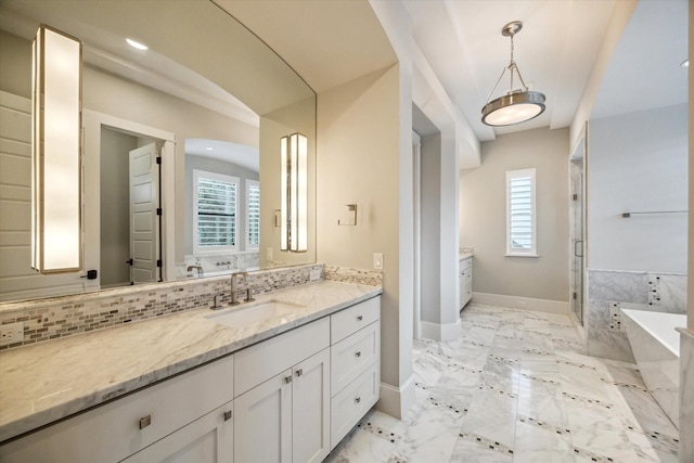 1116 W Drew St, Houston, TX 77006 - bathroom featuring vanity, a freestanding tub, healthy amount of natural light, a shower stall, and recessed lighting