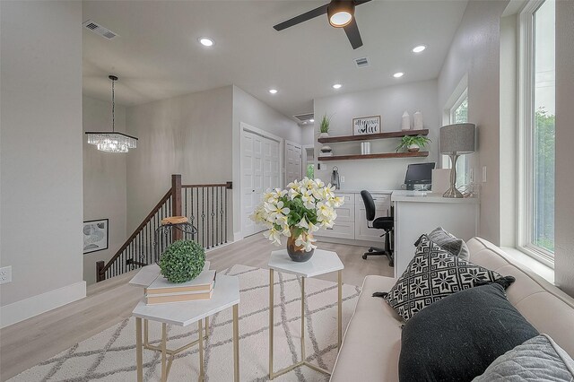 7108 Saint Augustine St, Houston, TX 77021 - living room featuring light wood-style floors, plenty of natural light, a desk, a ceiling fan, and recessed lighting