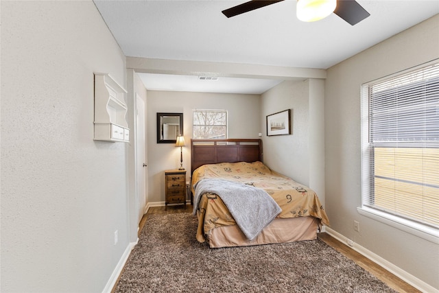 3318 Europa St, Houston, TX 77022 - bedroom with wood finished floors and a ceiling fan