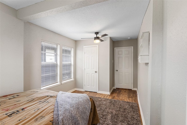 3318 Europa St, Houston, TX 77022 - bedroom with wood finished floors, ceiling fan, and a closet