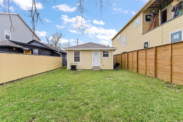 3318 Europa St, Houston, TX 77022 - back of property featuring a fenced backyard and an outdoor structure