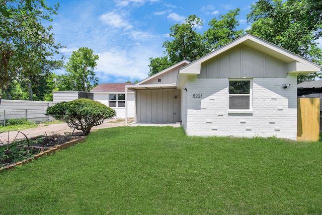8221 Hezekiah Ln, Houston, TX 77088 - back of property with board and batten siding and brick siding
