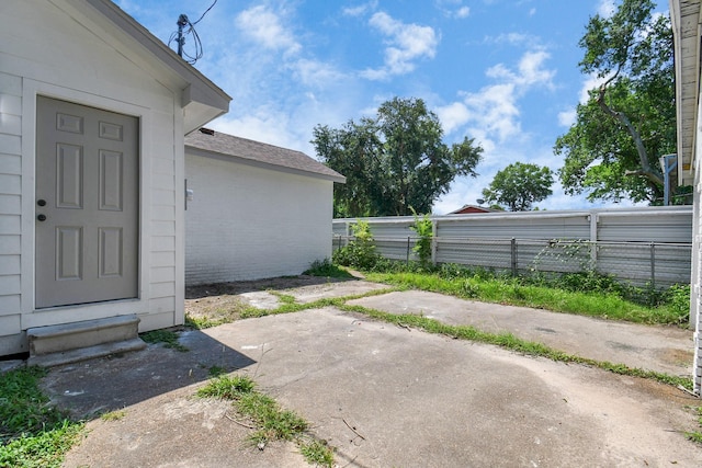 8221 Hezekiah Ln, Houston, TX 77088 - view of yard featuring a patio area and entry steps
