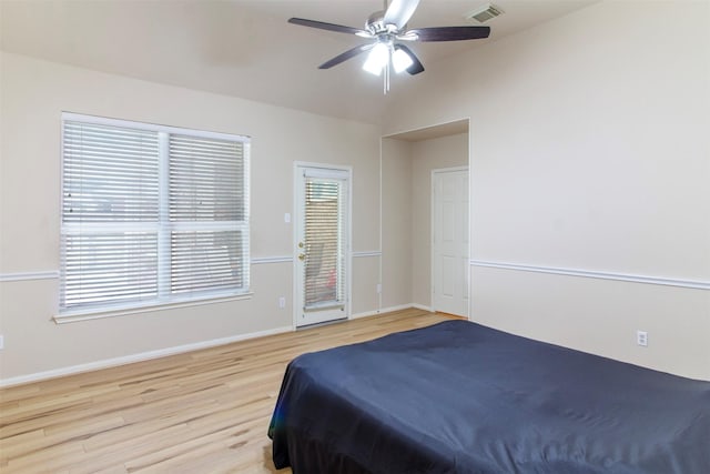 14510 Kings Head Dr, Houston, TX 77044 - bedroom with wood finished floors, ceiling fan, and lofted ceiling