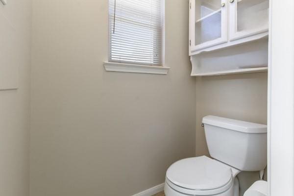14510 Kings Head Dr, Houston, TX 77044 - bathroom featuring toilet and baseboards