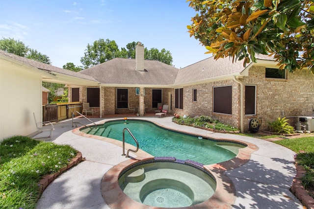 14510 Kings Head Dr, Houston, TX 77044 - view of pool featuring a patio and a pool with connected hot tub