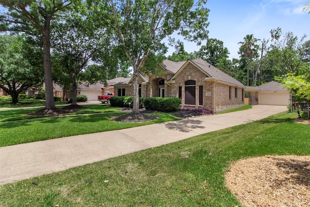 14510 Kings Head Dr, Houston, TX 77044 - single story home featuring brick siding, a front yard, and a shingled roof