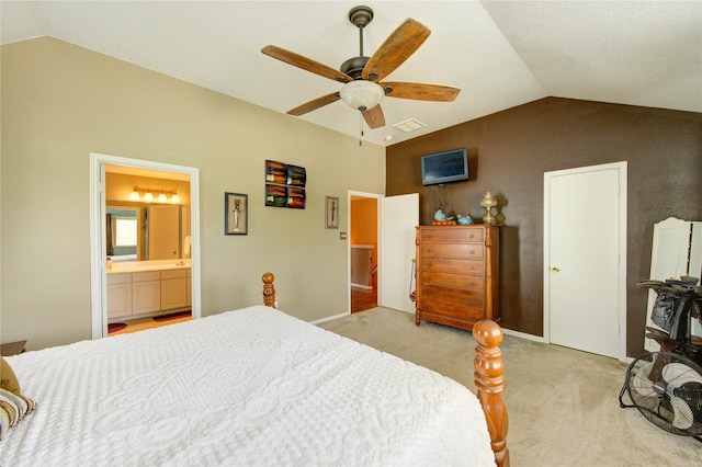 11734 Filaree Trl, Houston, TX 77044 - bedroom featuring lofted ceiling, light colored carpet, ensuite bath, and ceiling fan