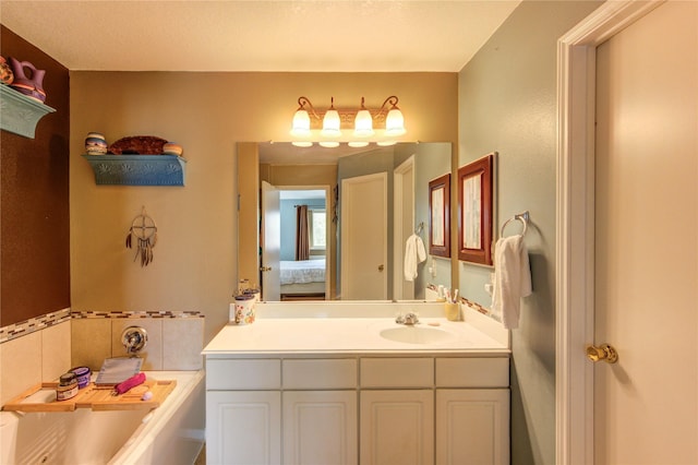 11734 Filaree Trl, Houston, TX 77044 - full bathroom with vanity, a garden tub, and ensuite bathroom