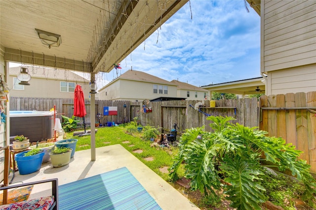 11734 Filaree Trl, Houston, TX 77044 - fenced backyard with a hot tub and a patio area