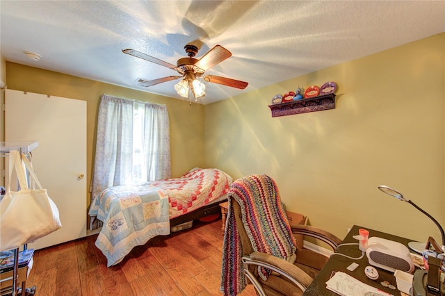 11734 Filaree Trl, Houston, TX 77044 - bedroom featuring wood finished floors and ceiling fan