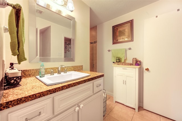 11734 Filaree Trl, Houston, TX 77044 - bathroom featuring vanity and tile patterned flooring