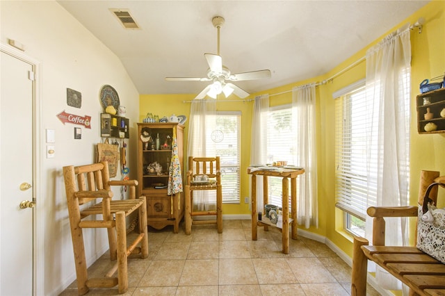 11734 Filaree Trl, Houston, TX 77044 - living area with a ceiling fan, light tile patterned flooring, and lofted ceiling