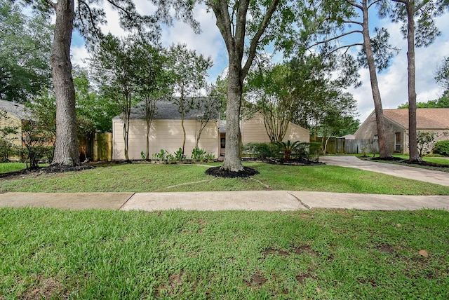 1010 Rock Canyon Dr, Katy, TX 77450 - mid-century home with driveway