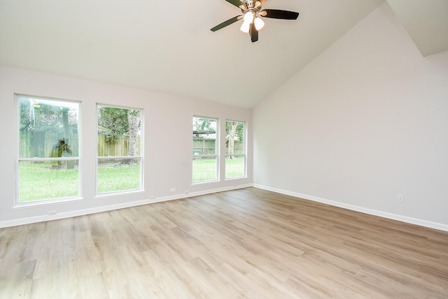 1010 Rock Canyon Dr, Katy, TX 77450 - spare room with a ceiling fan, light wood-type flooring, and vaulted ceiling