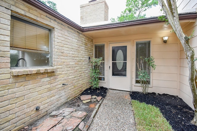 1010 Rock Canyon Dr, Katy, TX 77450 - property entrance with a chimney