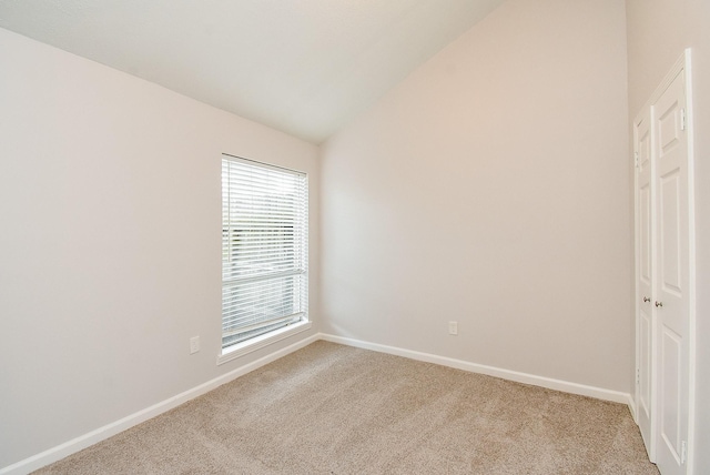 1010 Rock Canyon Dr, Katy, TX 77450 - unfurnished room with light carpet and vaulted ceiling