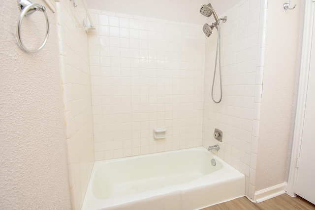 1010 Rock Canyon Dr, Katy, TX 77450 - bathroom featuring wood finished floors and shower / tub combination