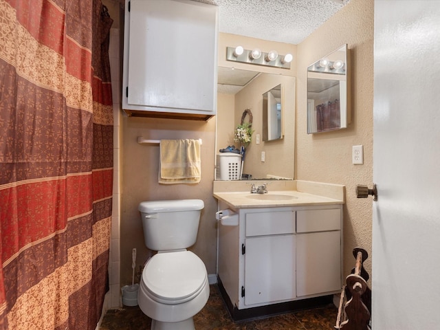 1505 Ward Rd Unit 215, Baytown, TX 77520 - bathroom featuring vanity, a textured ceiling, and a shower with curtain