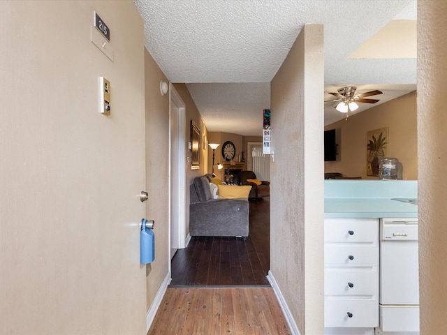 1505 Ward Rd Unit 215, Baytown, TX 77520 - corridor featuring wood finished floors and a textured ceiling