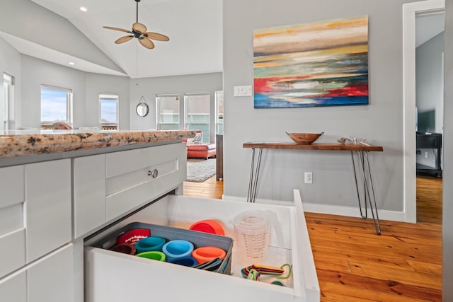 18607 Warrior Rd, Galveston, TX 77554 - rec room with wood-type flooring, vaulted ceiling, recessed lighting, and a ceiling fan