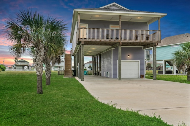 18607 Warrior Rd, Galveston, TX 77554 - beach home featuring a garage, a yard, and driveway