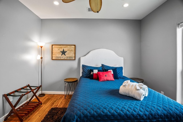 18607 Warrior Rd, Galveston, TX 77554 - bedroom with wood finished floors, recessed lighting, and a ceiling fan
