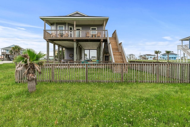 18607 Warrior Rd, Galveston, TX 77554 - view of front facade featuring a fenced backyard and stairway