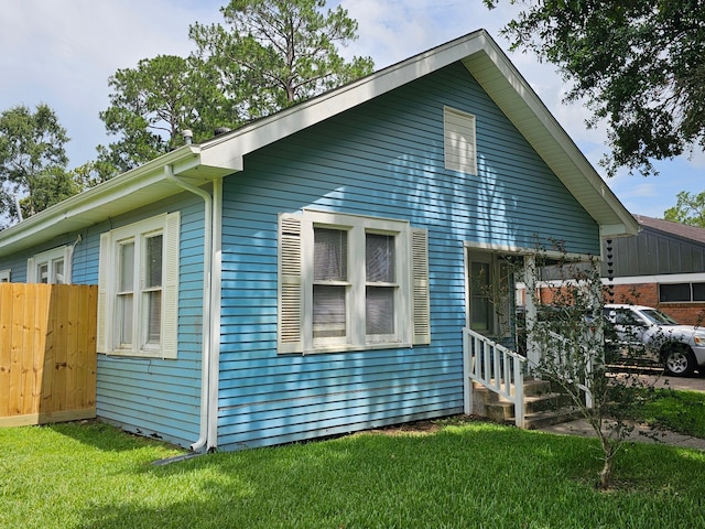 518 Bowie St, Liberty, TX 77575 - view of property exterior featuring entry steps