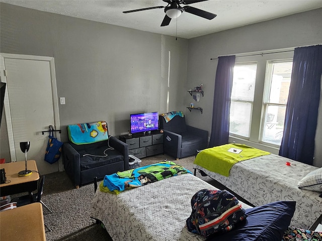 518 Bowie St, Liberty, TX 77575 - living room featuring ceiling fan and carpet