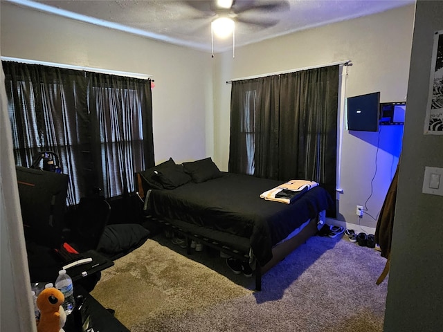 518 Bowie St, Liberty, TX 77575 - bedroom featuring carpet and a ceiling fan