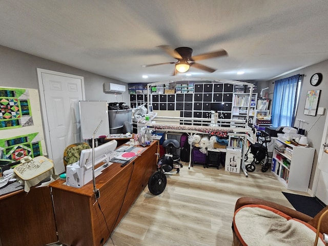 518 Bowie St, Liberty, TX 77575 - home office featuring a wall mounted air conditioner, ceiling fan, and wood finished floors
