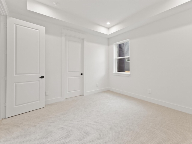 1604 Mary St, Houston, TX 77026 - unfurnished room featuring recessed lighting, carpet floors, and a raised ceiling