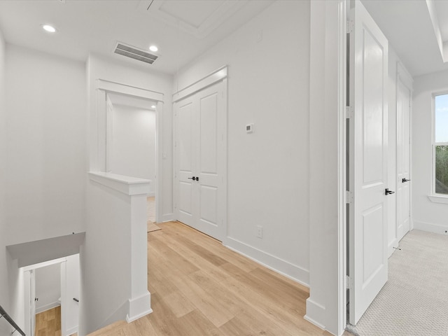 1604 Mary St, Houston, TX 77026 - hallway featuring an upstairs landing, light wood-style flooring, and recessed lighting
