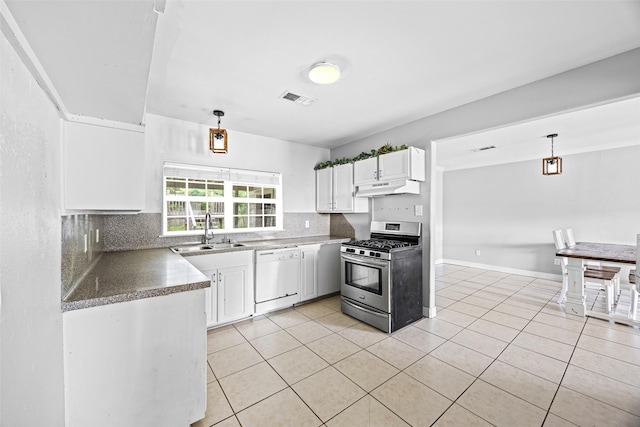4535 Clermont Ave, Groves, TX 77619 - kitchen featuring gas stove, dishwasher, under cabinet range hood, backsplash, and white cabinetry