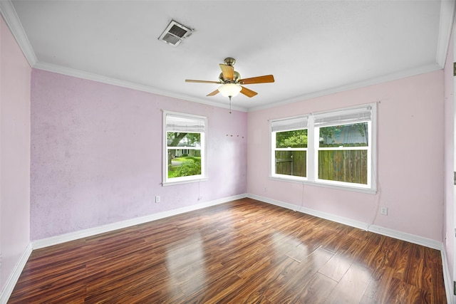4535 Clermont Ave, Groves, TX 77619 - spare room with wood finished floors, ornamental molding, and a ceiling fan